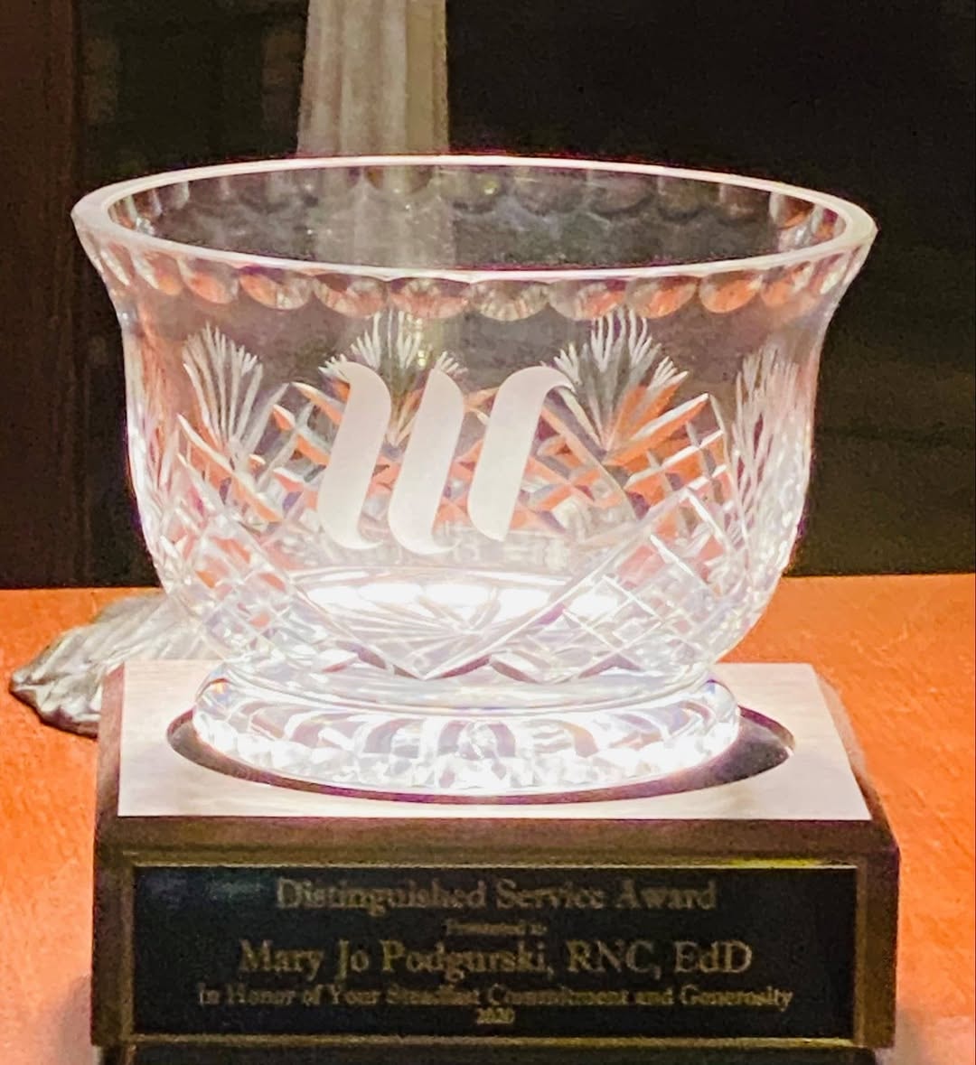 Dr. Mary Jo Podgurski with an award