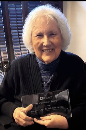 Award presented to Dr. Mary Jo Podgurski